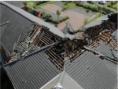 Aerial view showing damage to roof structure.jpg