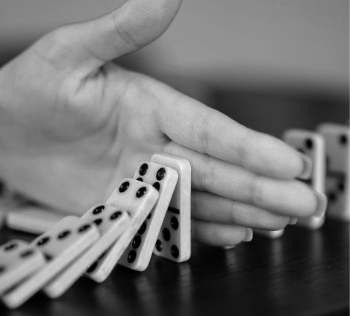 Dominoes and hand bw 350.jpg