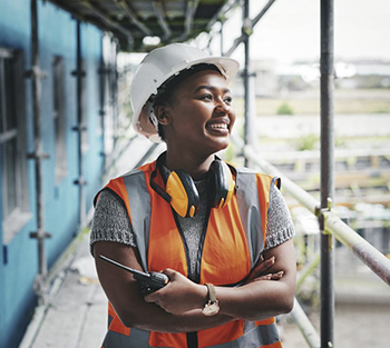 Woman wearing PPE on a construction site 350.jpg
