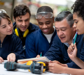 CIOB Teacher talking to a group of students 350.jpg
